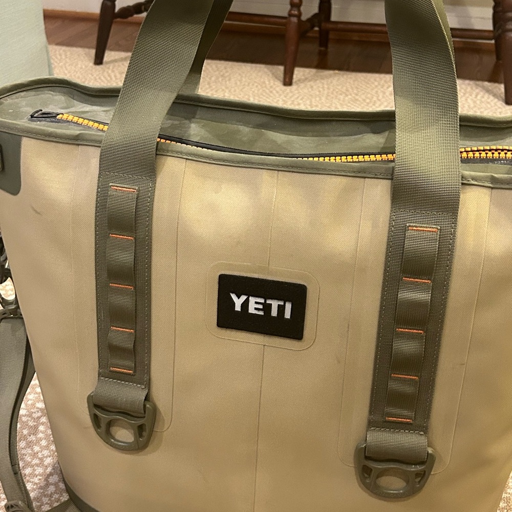 Yeti Hopper30 cooler. Shoulder strap. Soft side. Field Green & orange zipper.